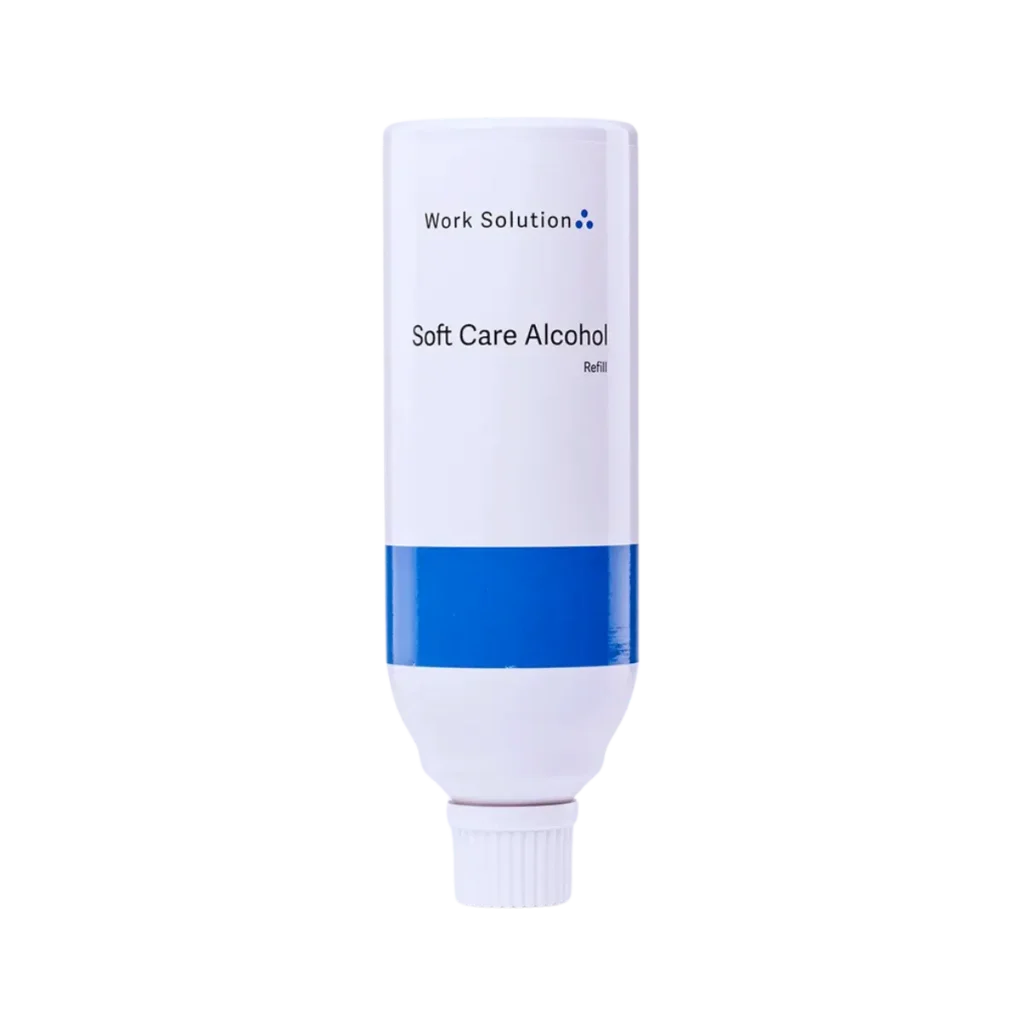 En vit refillbehållare från Work Solution med etiketten "Soft Care Alcohol". Behållaren har en blå detalj nära botten och är avsedd för påfyllning av handsprit.