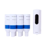 Sex refillflaskor för skumtvål från Work Solution, märkta "Soft care foam" med blå etikett, tillsammans med en vit automatisk tvålpump med svart sensorfönster.